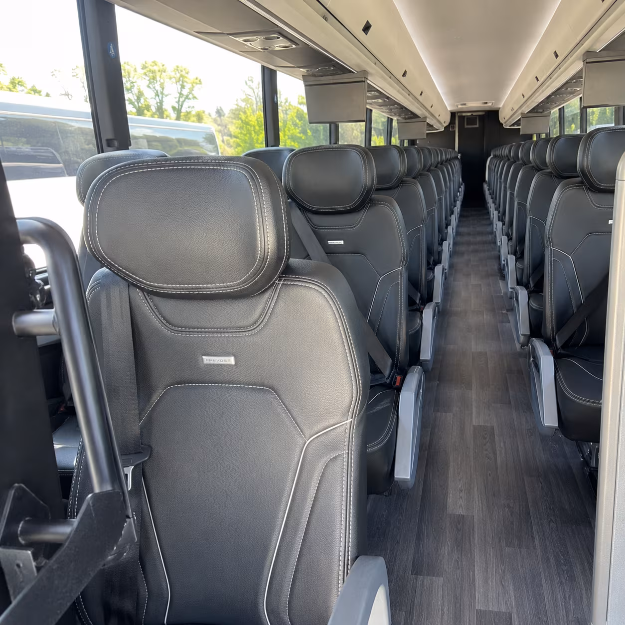 charter buses for large cambridge prom groups coordinating across multiple pickup points